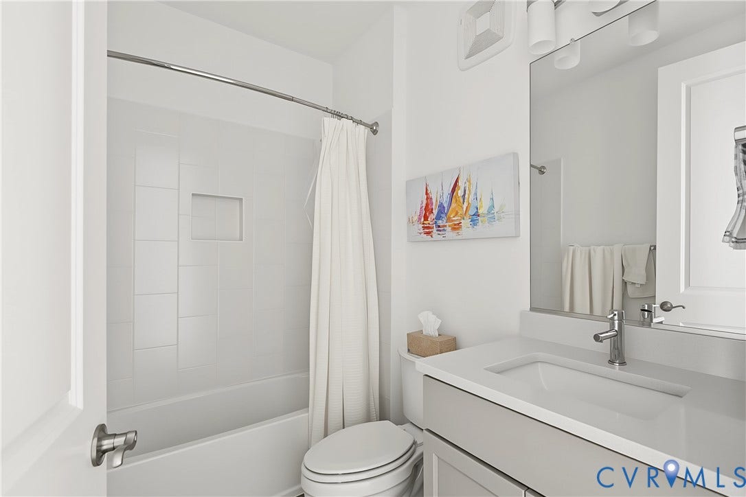 White tile bath surround with a recessed niche