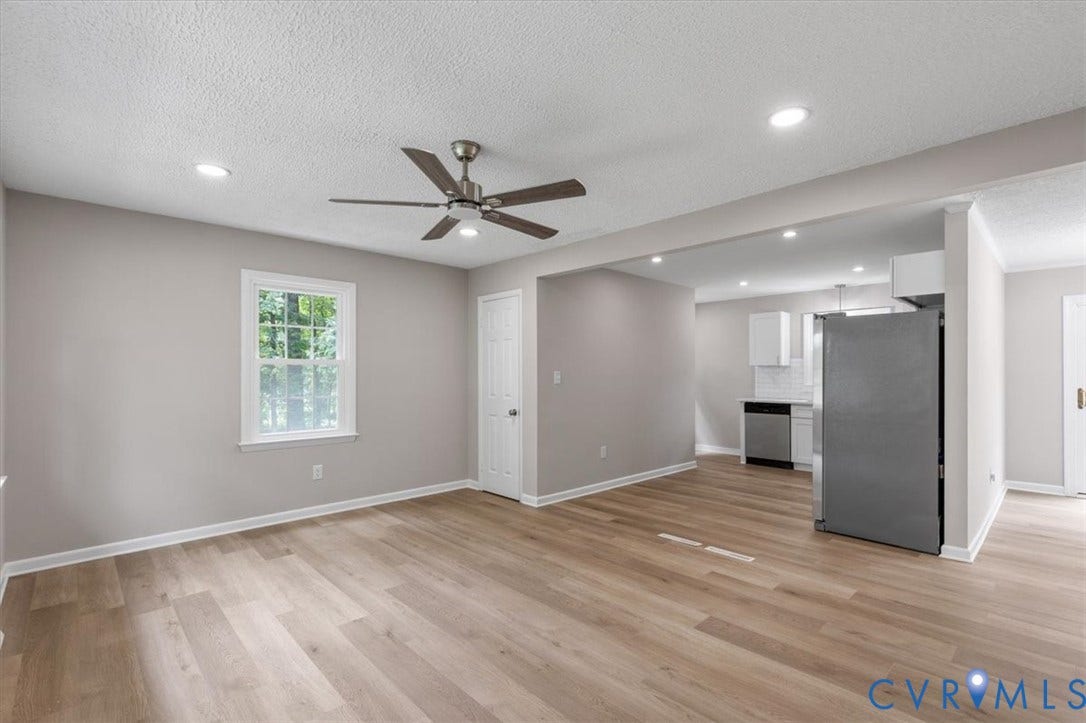 3308 Sylvania Road, Chesterfield, VA 23831 Wood-finish flooring throughout, recessed ceiling lighting, ceiling fan with integrated light, and a white window with exterior views