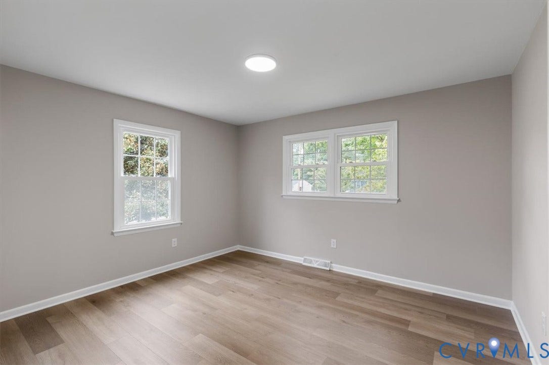3308 Sylvania Road, Chesterfield, VA 23831 Wood-finish flooring, white trim, recessed lighting, and multiple windows