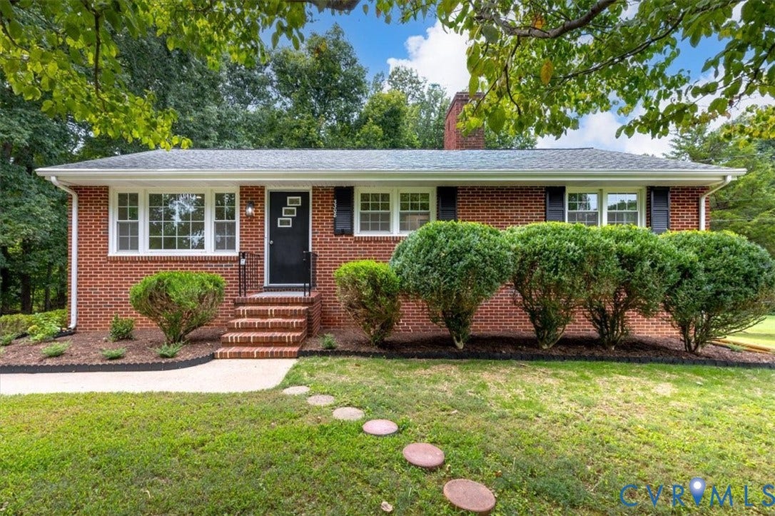 3308 Sylvania Road, Chesterfield, VA 23831 Brick exterior with white trim, black shutters, and an asphalt shingle roof