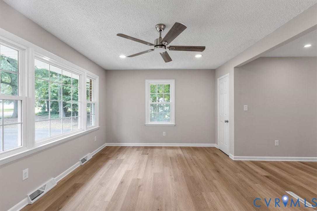 3308 Sylvania Road, Chesterfield, VA 23831 Wood-finish flooring, white trim, recessed lighting, ceiling fan, and multiple windows