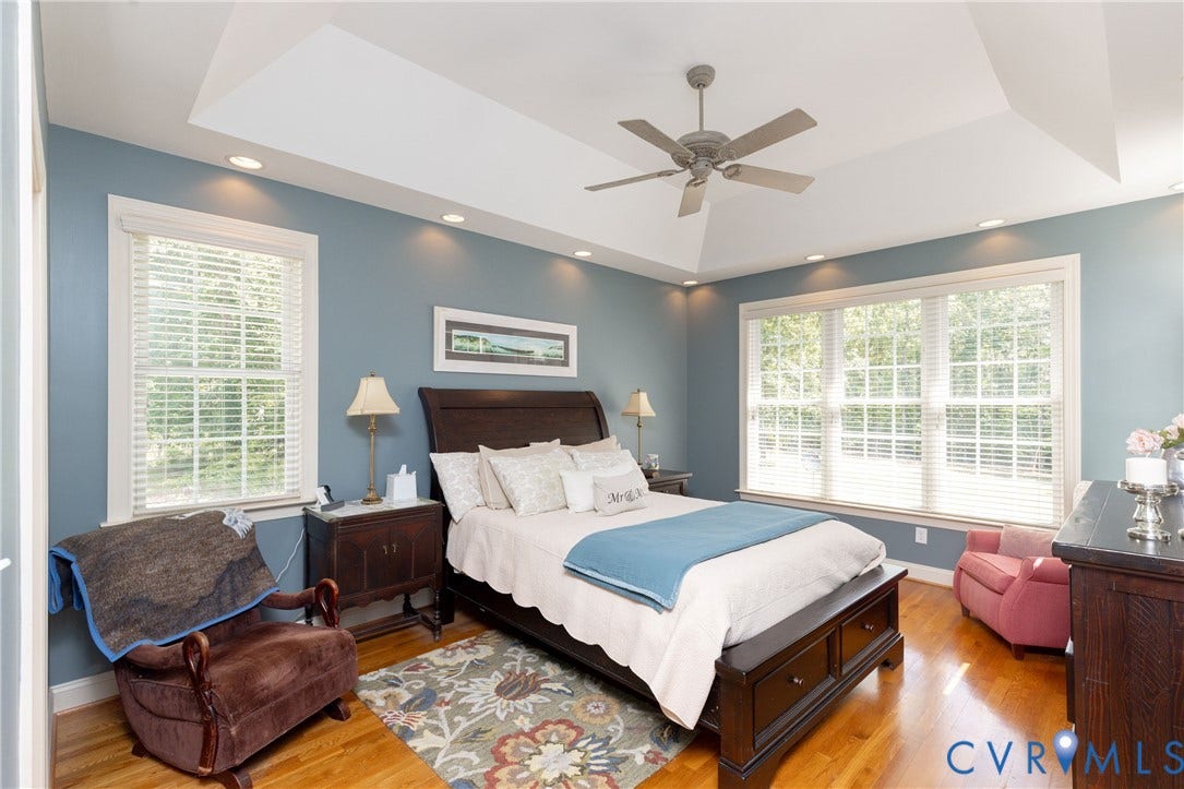 Spacious with 10' tray ceiling and door to deck