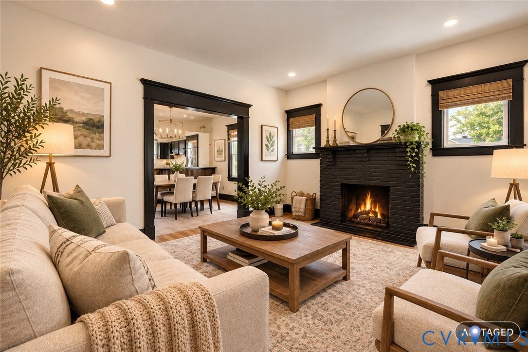 Wood-finish flooring, recessed lighting, and a black brick fireplace