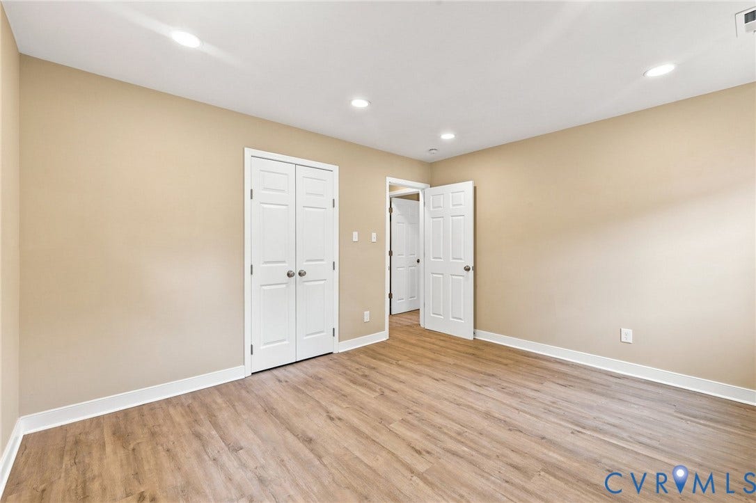 3221 Clintwood Road, Midlothian, VA 23112 Recessed lighting, wood-finish flooring, neutral-toned walls, white trim, and white paneled doors