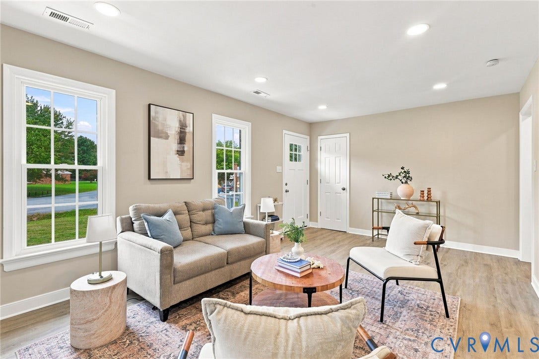 3221 Clintwood Road, Midlothian, VA 23112 Neutral wall color, recessed lighting, wood-finish flooring, multiple windows, and a white paneled door