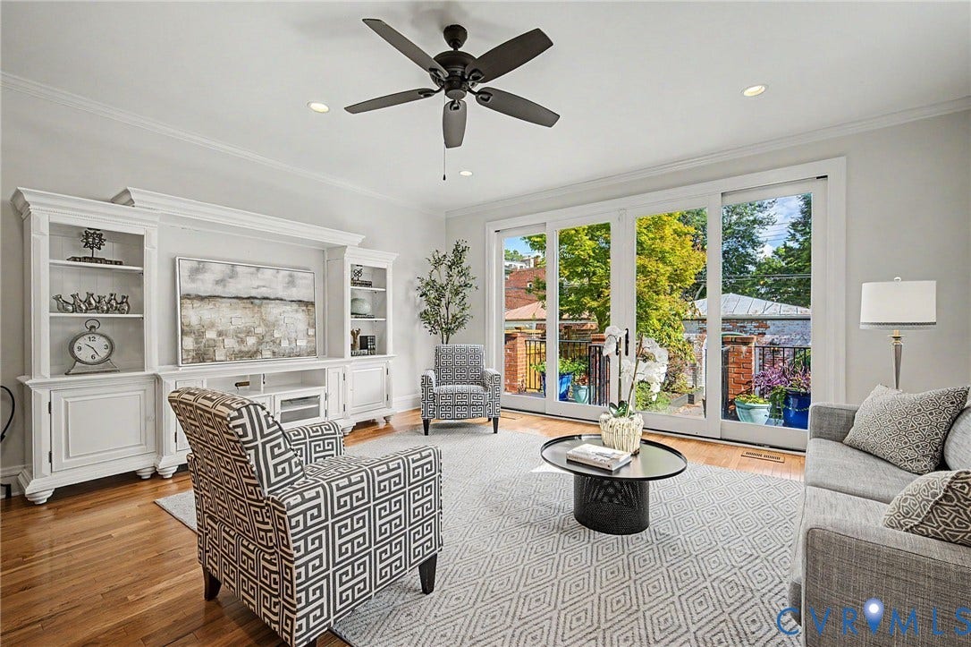 Another view of the family room, with the sliders and rear deck visible.