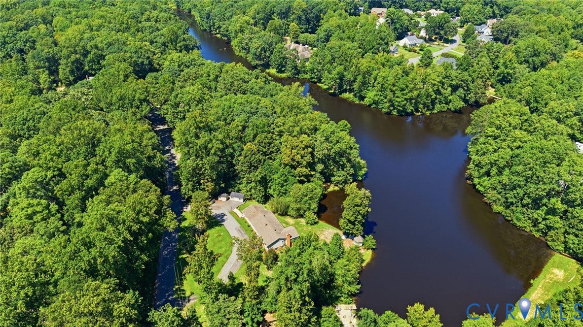 4512 Forrestal Road, Chester, VA 23831 Waterfront estate nestled within mature landscaping and towering trees