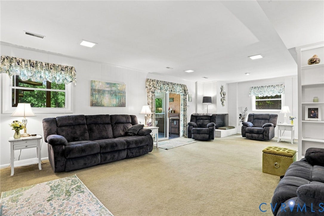 4512 Forrestal Road, Chester, VA 23831 Spacious room featuring carpet flooring, built-in shelving, white walls, and recessed lighting