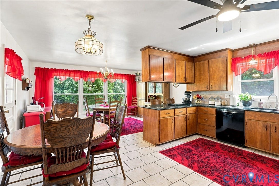 4512 Forrestal Road, Chester, VA 23831 Kitchen featuring wood cabinetry, black appliances, dark countertops, a ceiling fan, and tiled flooring