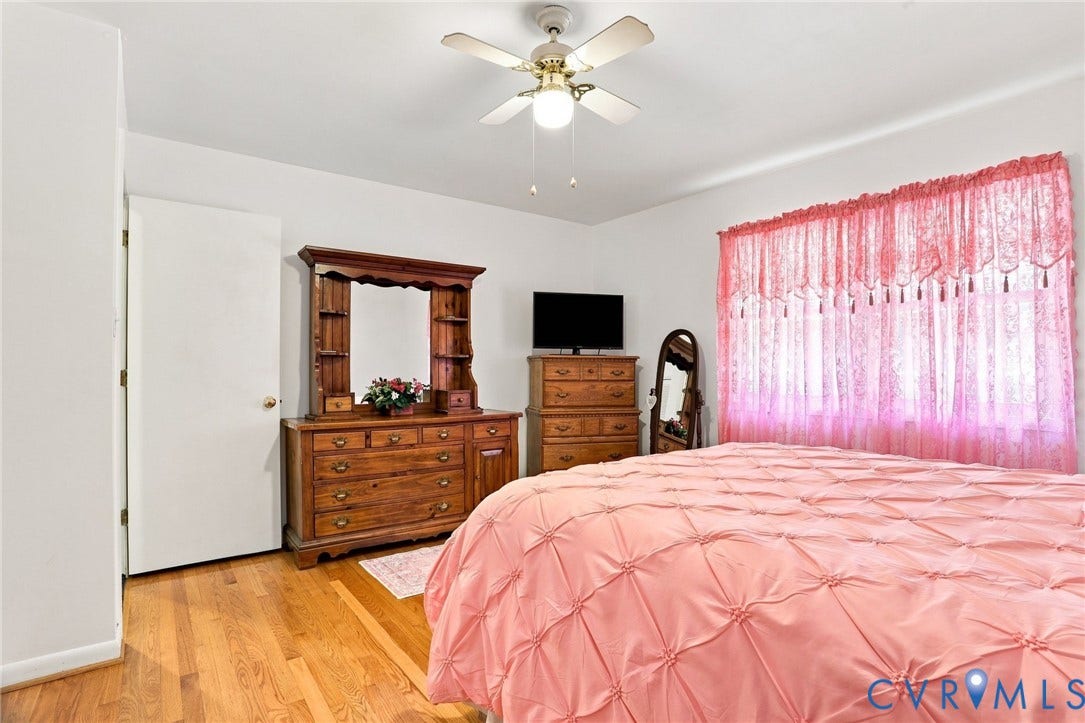 4512 Forrestal Road, Chester, VA 23831 Hardwood flooring, ceiling fan, white walls, white interior door