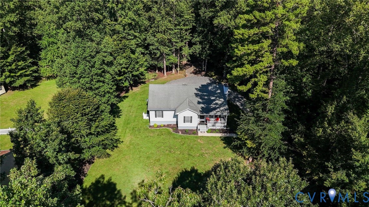 1577 Moody Town Road, Bumpass, VA 23024 Light-colored siding exterior with a dark-toned roof