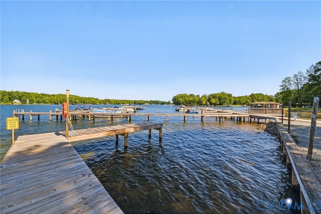 1577 Moody Town Road, Bumpass, VA 23024 Expansive waterfront access with multiple wooden docks