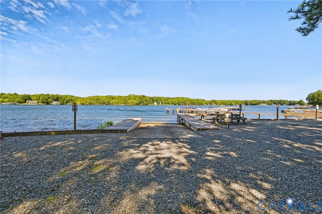 1577 Moody Town Road, Bumpass, VA 23024 Gravel ground cover with water frontage, multiple docks, and a boat launch