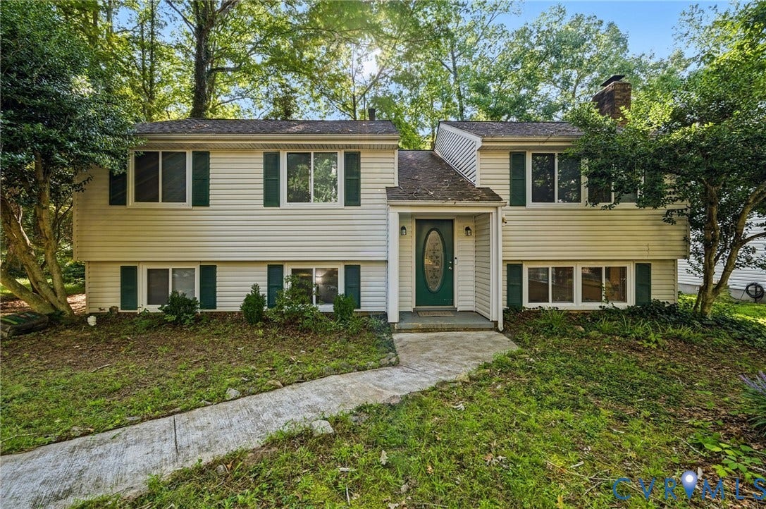2709 Sutters Mill Court, Midlothian, VA 23112 Split-level home featuring light-colored siding and green shutters