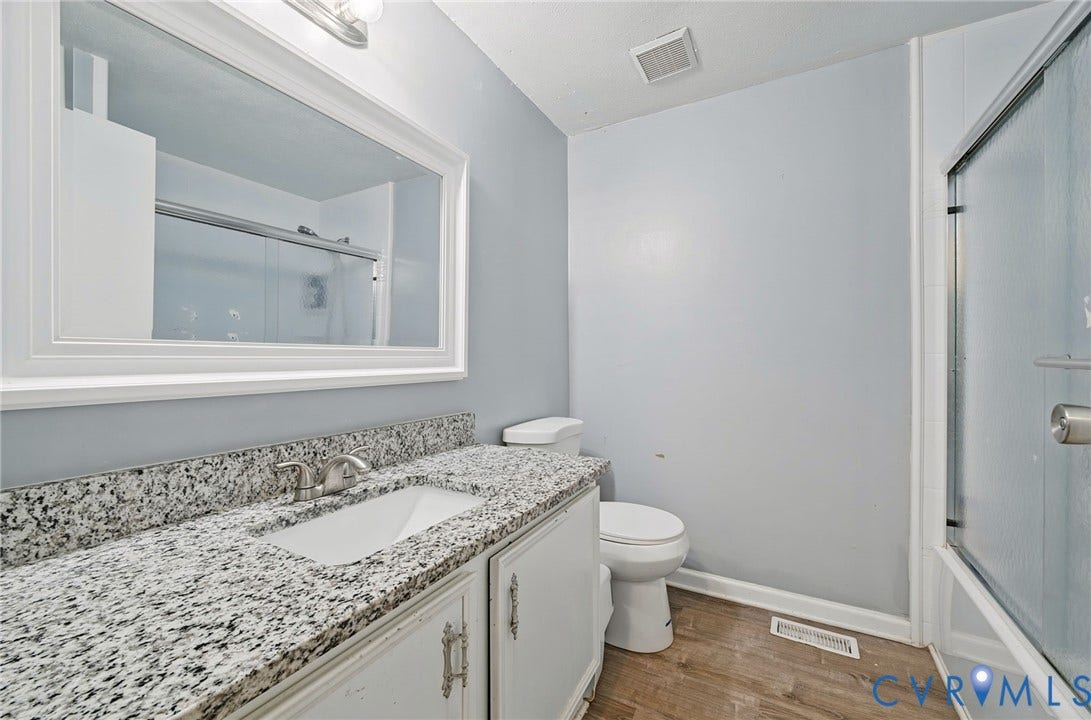 2709 Sutters Mill Court, Midlothian, VA 23112 Vanity with granite-style countertop, undermount sink, and brushed nickel faucet