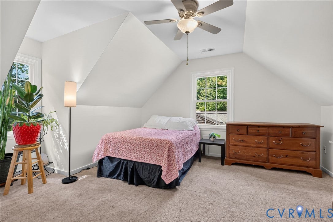 7248 Full Rack Drive, Midlothian, VA 23112 Vaulted ceiling with a ceiling fan, dual windows, and light-toned carpeting