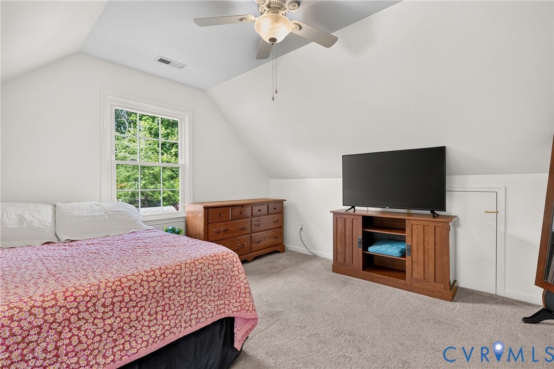 7248 Full Rack Drive, Midlothian, VA 23112 Vaulted ceiling with a ceiling fan