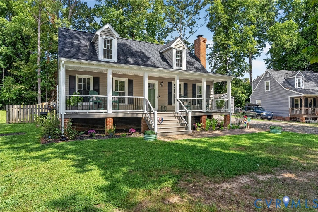 7248 Full Rack Drive, Midlothian, VA 23112 Dormered residence with a covered front porch, exterior siding, and a prominent brick chimney