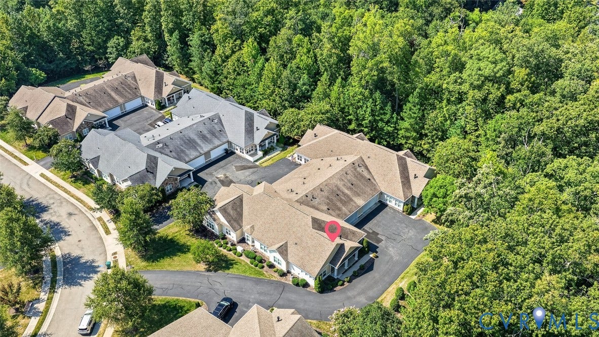 11116 Lantern Way, North Chesterfield, VA 23236 Property featuring a multi-building configuration with gabled roofs, surrounded by extensive mature trees, and an asphalt paved driveway