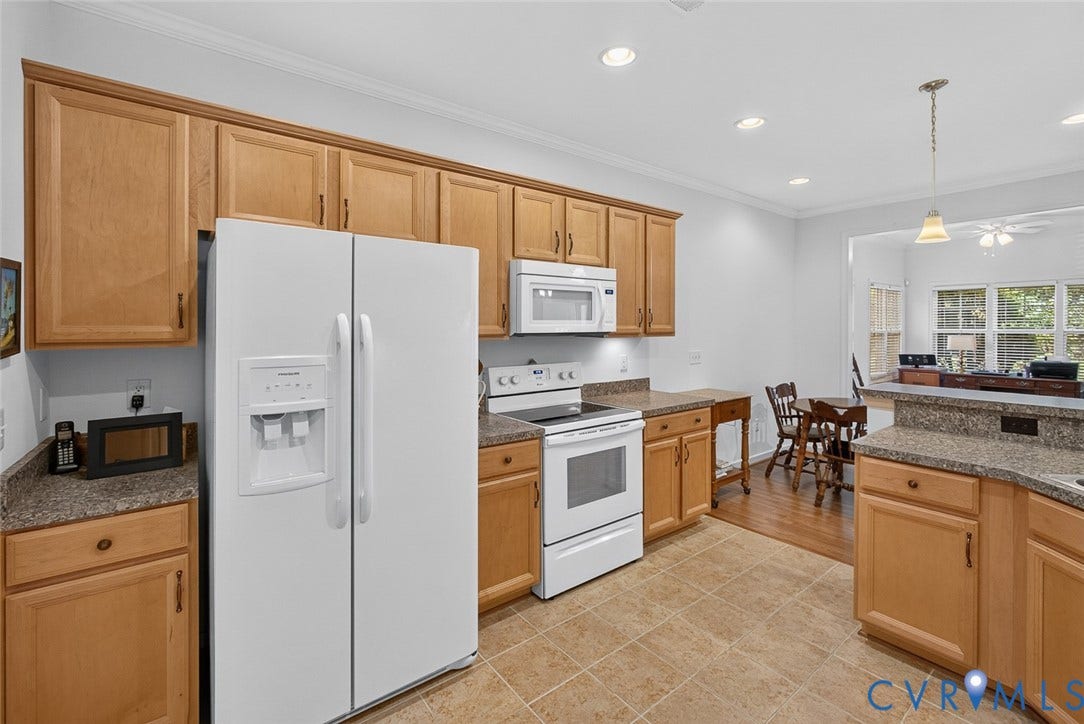 11116 Lantern Way, North Chesterfield, VA 23236 Kitchen featuring wood cabinetry, speckled countertops, integrated white appliances, recessed lighting, and tile flooring