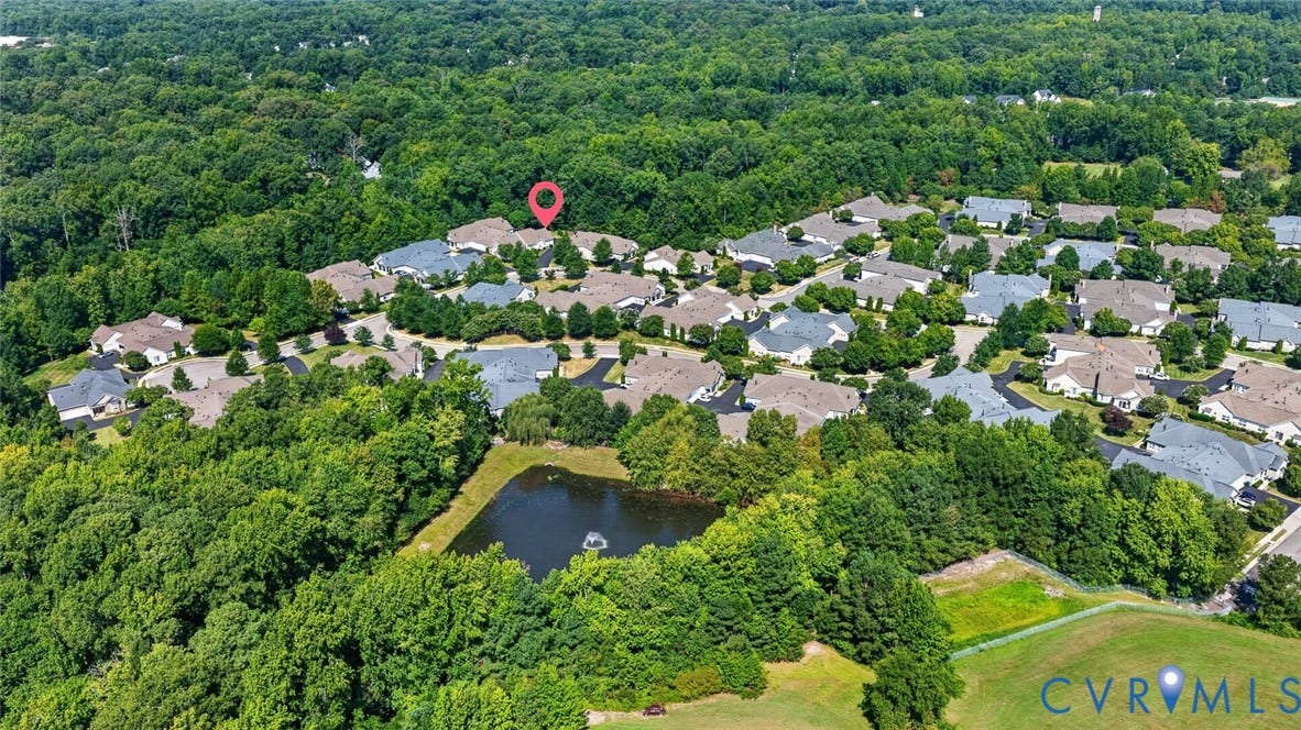 11116 Lantern Way, North Chesterfield, VA 23236 Residential community with mature trees, established homes, a central pond, and surrounding green spaces