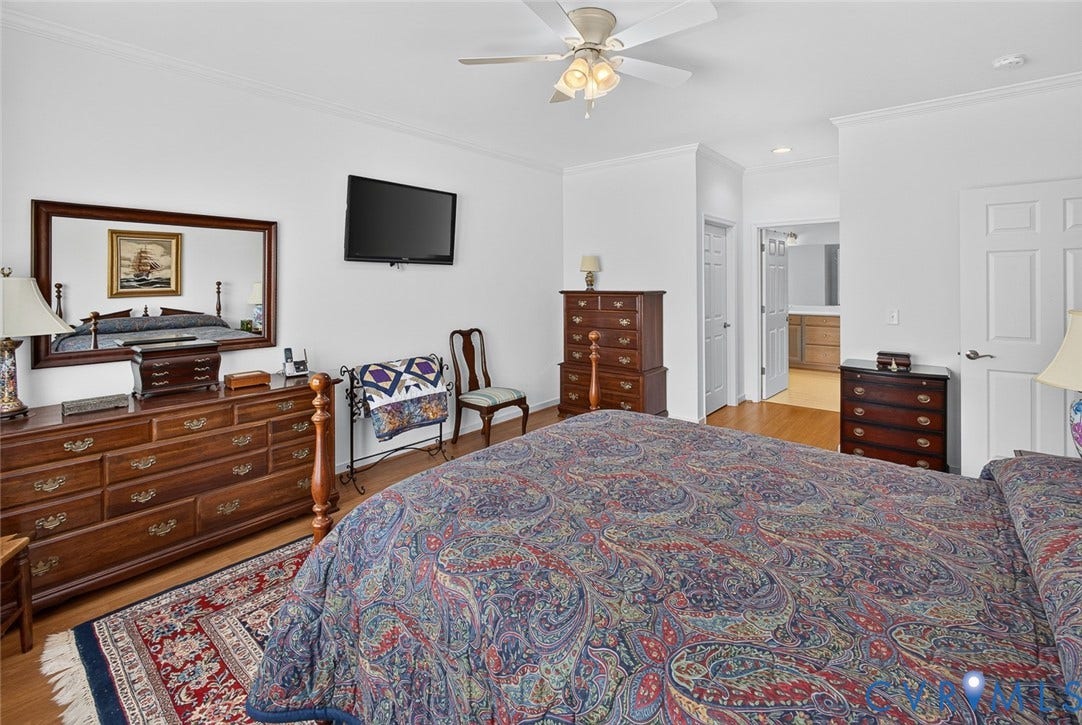 11116 Lantern Way, North Chesterfield, VA 23236 Hardwood flooring, crown molding, ceiling fan, white paneled doors, and an en suite bath entry