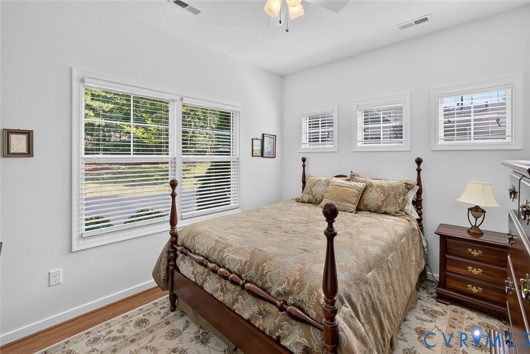 11116 Lantern Way, North Chesterfield, VA 23236 Wood-finish flooring, multiple windows with blinds, and white walls