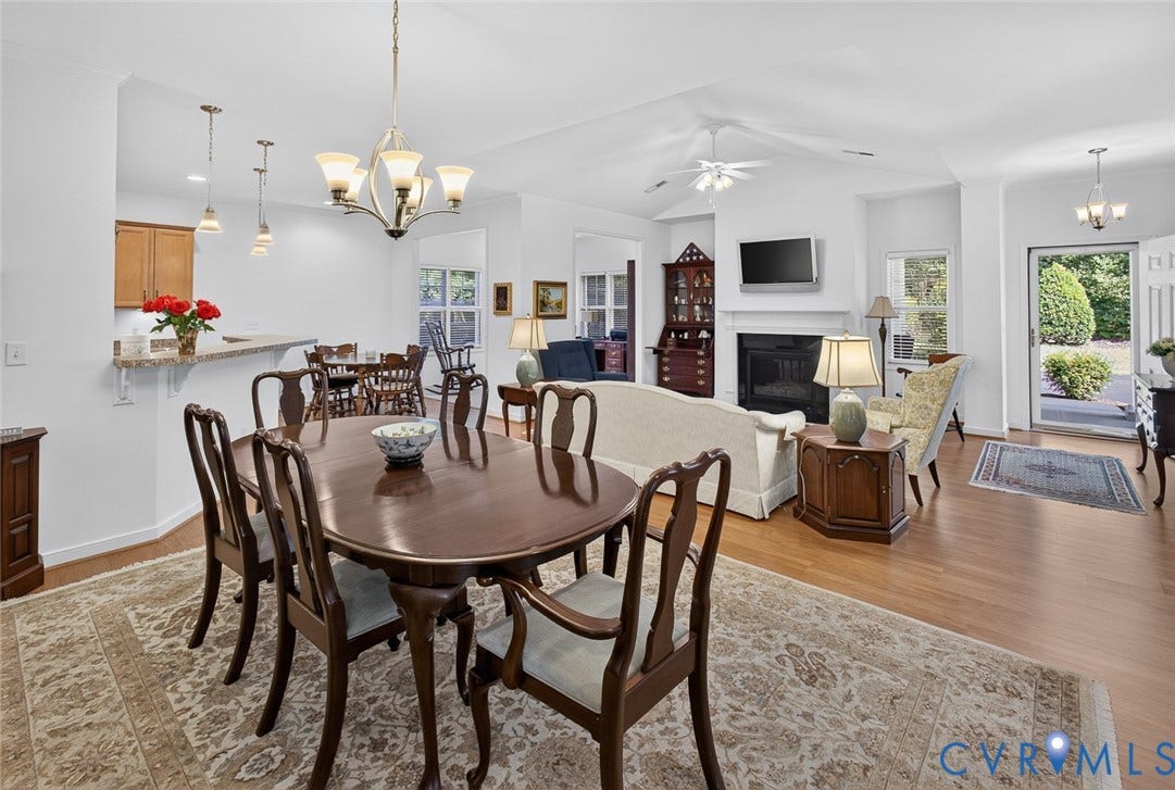 11116 Lantern Way, North Chesterfield, VA 23236 Vaulted ceiling, wood-finish flooring, fireplace, kitchen pass-through with bar seating, and recessed lighting