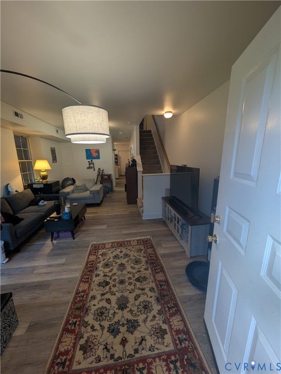 1826 Idlewood Avenue, Randolph, Richmond, VA 23220 Wood-finish flooring throughout, with a drum pendant light fixture