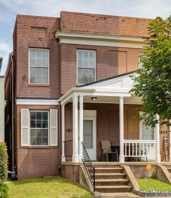 1826 Idlewood Avenue, Randolph, Richmond, VA 23220 Brick exterior with white window shutters