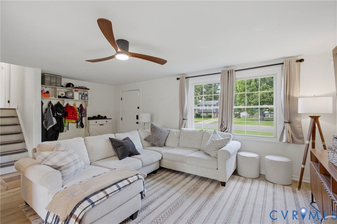 1905 Reagan Road, Henrico, VA 23228 Hardwood-style flooring, a contemporary ceiling fan, and built-in shelving