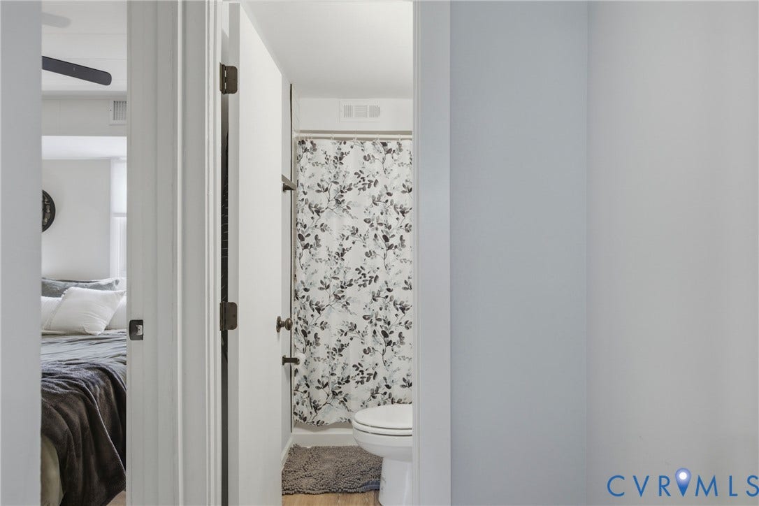 1905 Reagan Road, Henrico, VA 23228 Bathroom featuring a shower with a shower curtain and a toilet