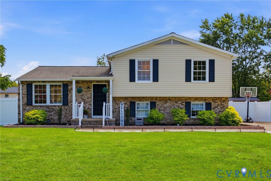 1905 Reagan Road, Henrico, VA 23228 Split-level residence featuring a brick and siding exterior
