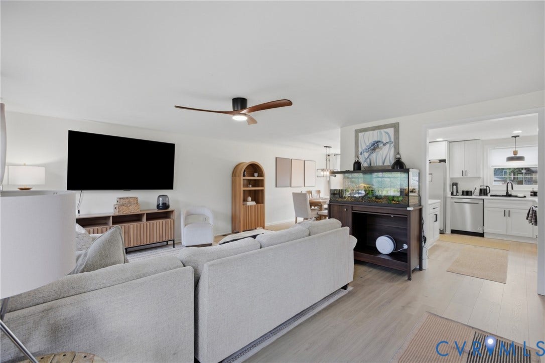 1905 Reagan Road, Henrico, VA 23228 Open-concept living area with wood-finish flooring, a contemporary ceiling fan, and recessed lighting