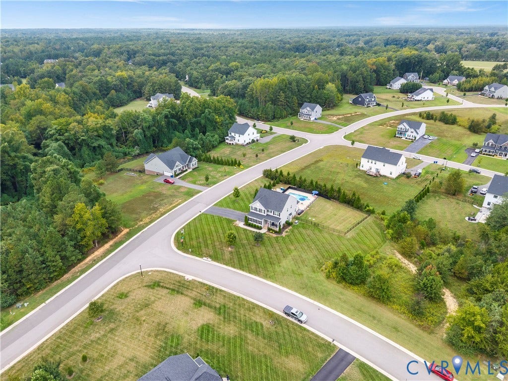 11707 Amara Drive, Chester / Highlands Golf Club, Chesterfield, VA 23838 Expansive residential development featuring paved streets, individual homes, and ample green space