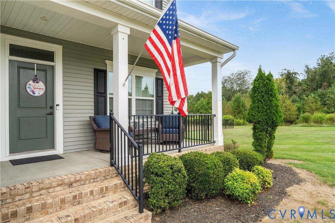 11707 Amara Drive, Chester / Highlands Golf Club, Chesterfield, VA 23838 Covered front porch with white columns, brick stairs, and black railings