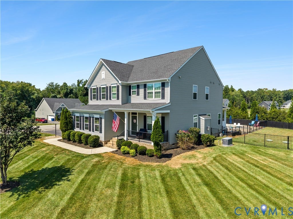11707 Amara Drive, Chester / Highlands Golf Club, Chesterfield, VA 23838 Two-story home with a gabled roof, light gray siding, and black window shutters
