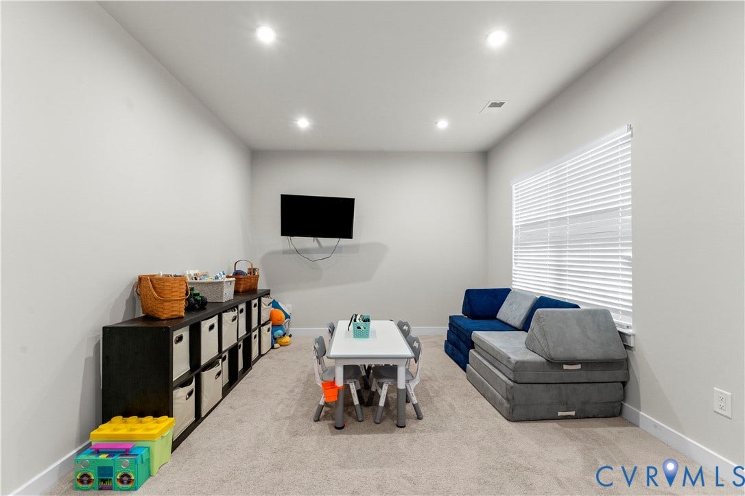 11707 Amara Drive, Chester / Highlands Golf Club, Chesterfield, VA 23838 Recessed lighting, wall-mounted television, window with horizontal blinds, and neutral-toned wall paint