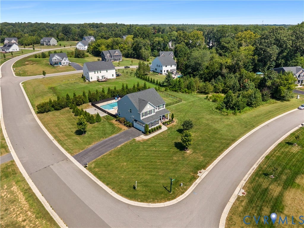 11707 Amara Drive, Chester / Highlands Golf Club, Chesterfield, VA 23838 Residential property with a corner lot, private swimming pool, paved driveway, and mature landscaping