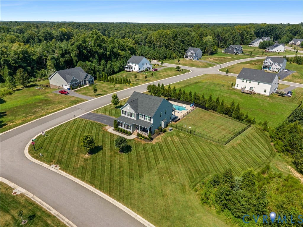 11707 Amara Drive, Chester / Highlands Golf Club, Chesterfield, VA 23838 Two-story residence with a covered front porch, fenced rear yard, and an in-ground swimming pool