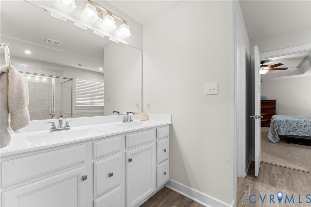 11707 Amara Drive, Chester / Highlands Golf Club, Chesterfield, VA 23838 Dual vanity with white cabinetry and chrome fixtures