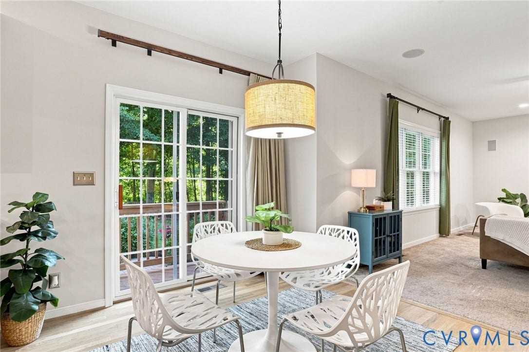 Sliding glass door, overhead lighting fixture, wood-finish flooring, recessed lighting, wall-mounted speakers