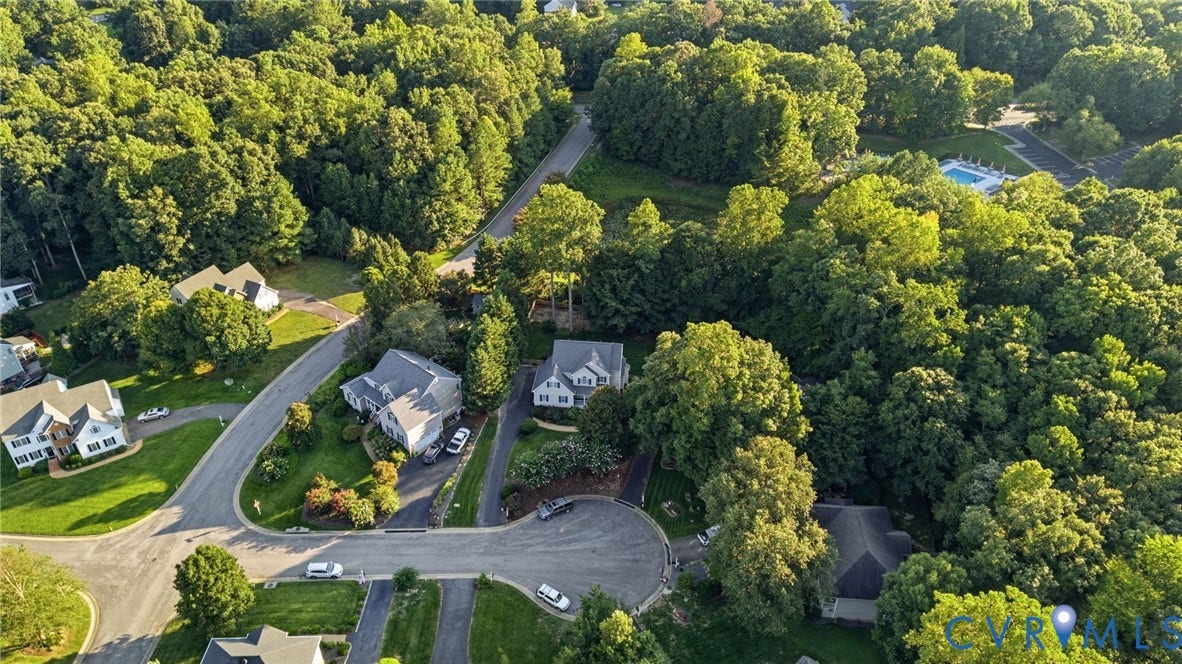Neighborhood featuring cul-de-sac streets, mature trees, and residential properties