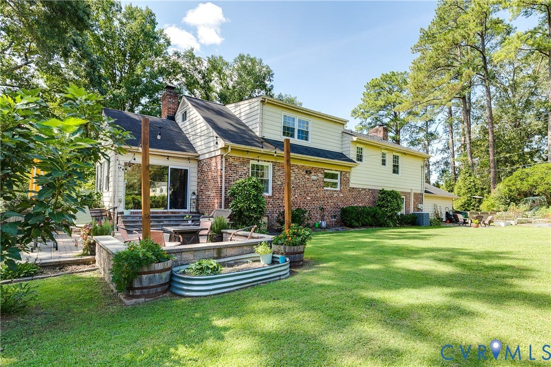 Spacious, flat yard space with mature landscaping
