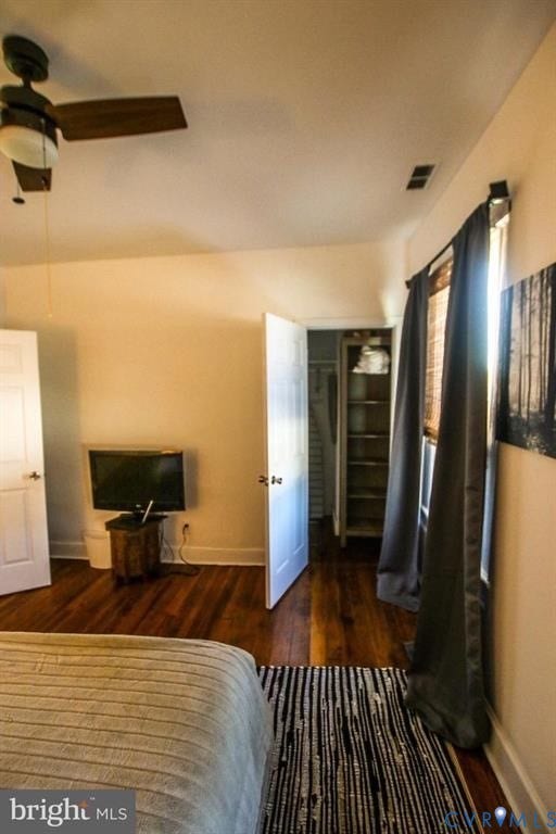 1910 W Main Street, The Historic Fan District, Richmond, VA 23220 Wood-finish flooring, ceiling fan with integrated lighting, open doorway to built-in shelving, and white interior doors