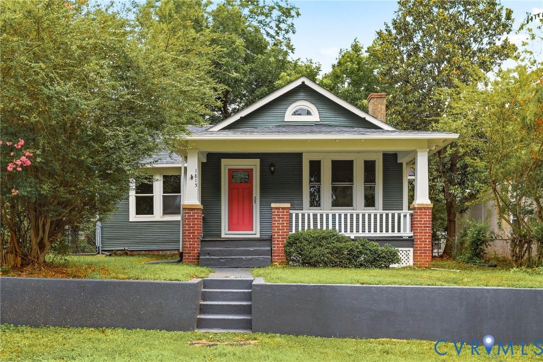 1815 Carlisle Avenue, Richmond, VA 23231 Exterior featuring a covered porch, red entry door, white trim, and a brick chimney