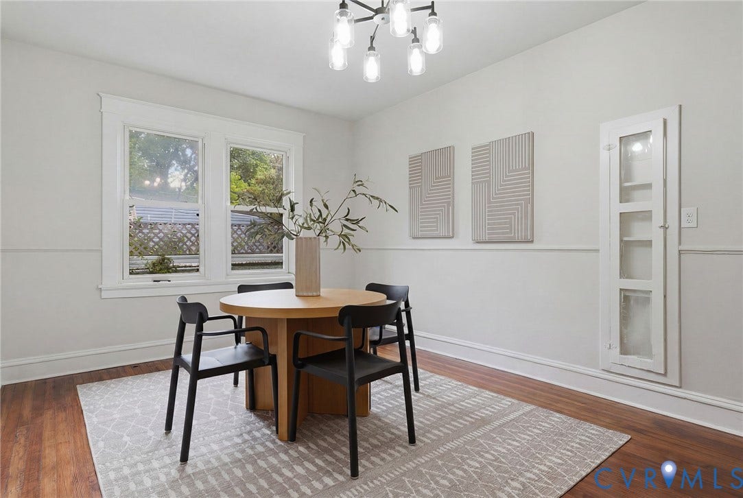 1815 Carlisle Avenue, Richmond, VA 23231 Hardwood flooring, multi-pane windows with white trim, built-in display cabinet with glass-paneled door, and a contemporary chandelier