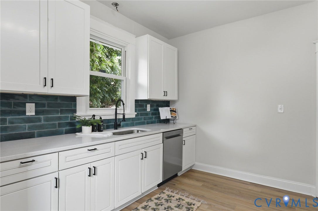 1815 Carlisle Avenue, Richmond, VA 23231 White shaker-style cabinetry with matte black hardware