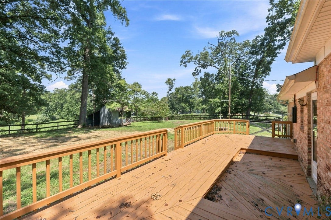 2707 Academy Road, Powhatan, VA 23139 Expansive wood deck with railing and brick exterior