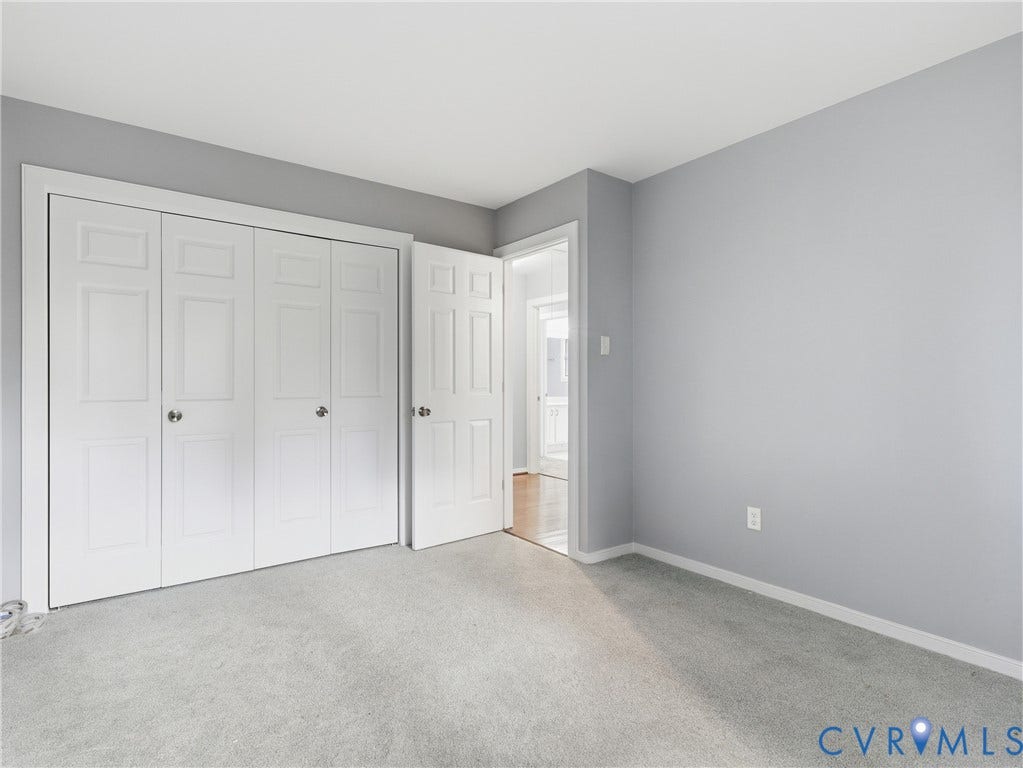 Neutral gray wall paint with white trim